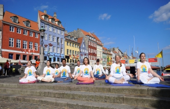 Yoga Flash mob at iconic Nyhavn in Copenhagen